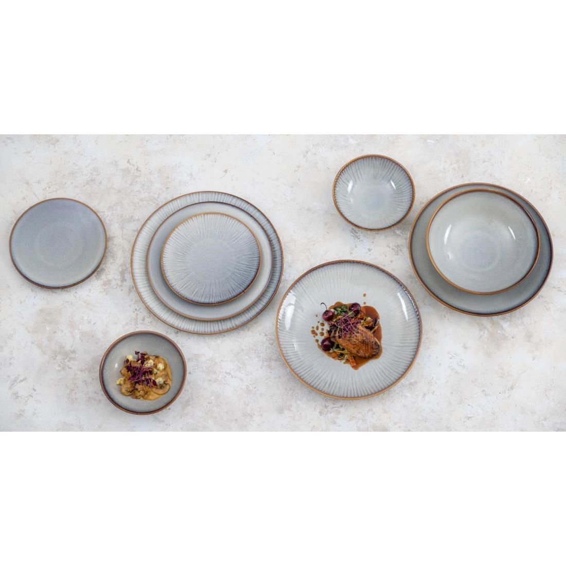 Vous pouvez acheter un Assiettes plates Olympia Drift gris uni 180 mm (lot de 6) chez Supplierz BV